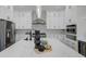 Modern kitchen with stainless steel appliances, a large center island, and ample cabinet space at 2014 Cambridge Ave, Atlanta, GA 30337