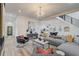 Spacious living room open to the modern kitchen, features a sleek design and comfortable seating at 2014 Cambridge Ave, Atlanta, GA 30337