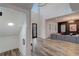 Bright open-concept interior with high ceilings, hardwood floors, and a glimpse of the modern living space at 2014 Cambridge Ave, Atlanta, GA 30337