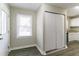 Bright entryway with natural light, closet, and luxury vinyl plank flooring flowing into the kitchen at 2818 Mcafee Rd, Decatur, GA 30032