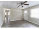 The living room has updated flooring, natural light, and neutral wall paint at 2818 Mcafee Rd, Decatur, GA 30032