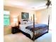 Bedroom with a four post bed and a side table at 301 Millbrook Farm Ct, Marietta, GA 30068