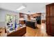 A kitchen offering a center island, stainless appliances, wood cabinetry, and access to the outdoor deck at 301 Millbrook Farm Ct, Marietta, GA 30068