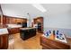 A kitchen offering stainless appliances, wood cabinetry, a center island and an adjacent dining area at 301 Millbrook Farm Ct, Marietta, GA 30068