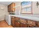 Functional laundry room with washer, dryer, cabinets, and ample countertop space at 301 Millbrook Farm Ct, Marietta, GA 30068