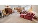 Inviting living room with a brick fireplace, built-in bookshelves, and comfortable seating arrangements at 301 Millbrook Farm Ct, Marietta, GA 30068