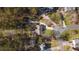 Overhead view showing location, roof, driveway and surrounding foliage at 326 Bethel Dr, Woodstock, GA 30189