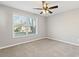Bedroom featuring a window, carpet, neutral walls, and ceiling fan at 326 Bethel Dr, Woodstock, GA 30189
