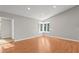 Bright bedroom with lots of natural light with hardwood floors and a large bay window at 326 Bethel Dr, Woodstock, GA 30189