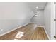 Bonus room showcasing light gray walls and new wood flooring at 326 Bethel Dr, Woodstock, GA 30189