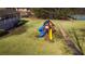 Community playground with playset and a winding path leading to other amenities at 326 Bethel Dr, Woodstock, GA 30189