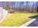 Spacious backyard featuring a swing set and ample space for outdoor activities and entertaining at 8684 Chestnut Ln, Lithia Springs, GA 30122