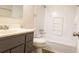 Bathroom with a shower, vanity and commode at 8684 Chestnut Ln, Lithia Springs, GA 30122