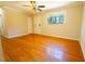 Spacious bedroom with hardwood floors, bright window, and closet for ample storage at 8684 Chestnut Ln, Lithia Springs, GA 30122