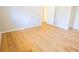 Bedroom with hardwood flooring and neutral wall paint at 8684 Chestnut Ln, Lithia Springs, GA 30122