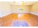 Large living room with hardwood floors, a decorative floor tile accent, and great natural light at 8684 Chestnut Ln, Lithia Springs, GA 30122