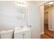 Bathroom featuring a single sink vanity, mirror and tiled shower/bath at 2379 Ridgeway Dr, Atlanta, GA 30360