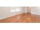 Bright living room featuring gleaming hardwood floors and large windows at 2379 Ridgeway Dr, Atlanta, GA 30360
