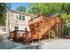 Charming home featuring a multi-level wooden deck perfect for outdoor entertaining and relaxation at 239 Lindbergh Ne Dr, Atlanta, GA 30305