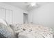 Bright bedroom featuring a ceiling fan and closet, providing a comfortable space at 239 Lindbergh Ne Dr, Atlanta, GA 30305