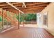 Expansive stained deck, surrounded by trees, perfect for outdoor entertaining at 239 Lindbergh Ne Dr, Atlanta, GA 30305