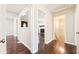 Hallway featuring hardwood floors, with views of the living room and a staircase at 239 Lindbergh Ne Dr, Atlanta, GA 30305