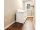 Convenient laundry area with modern white appliances and window at 239 Lindbergh Ne Dr, Atlanta, GA 30305