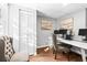 Bright office with gray walls and a pair of landscape paintings above the desk at 239 Lindbergh Ne Dr, Atlanta, GA 30305