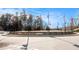 Beautiful view of the 'Flags Over Georgia' community entrance circle at 6350 Old Wood Hollow Way, Buford, GA 30518