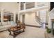 Spacious living room with high ceilings, fireplace, and staircase, perfect for entertaining guests at 6350 Old Wood Hollow Way, Buford, GA 30518