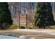 Attractive community entrance sign directs residents to various community amenities at 6350 Old Wood Hollow Way, Buford, GA 30518