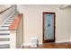 Basement entrance with staircase and wine cellar at 6350 Old Wood Hollow Way, Buford, GA 30518