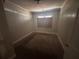 Small bedroom with carpeted floor at 80 Harlan Sw Rd, Atlanta, GA 30311