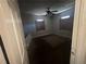 Bedroom with dark brown carpet and ceiling fan at 80 Harlan Sw Rd, Atlanta, GA 30311