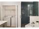 Well-appointed bathroom with a shower, bathtub, and convenient laundry area at 1059 Park Row North Se, Atlanta, GA 30312