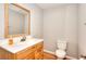 Cozy bathroom with a wood vanity and mirror at 1294 Summit Chase Dr, Snellville, GA 30078