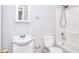 Bathroom featuring a vanity, toilet, shower and tub, and bright lighting at 1294 Summit Chase Dr, Snellville, GA 30078