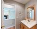 Bathroom featuring a sink with wood trim, a mirror, and grey walls at 1294 Summit Chase Dr, Snellville, GA 30078