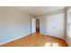 Bedroom featuring wood floors, neutral walls, double closets and bright natural light at 1294 Summit Chase Dr, Snellville, GA 30078