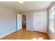 Bedroom featuring hardwood floors, closet and doorway at 1294 Summit Chase Dr, Snellville, GA 30078