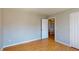 Bedroom with hardwood floors and open doorway at 1294 Summit Chase Dr, Snellville, GA 30078