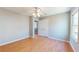 Bedroom featuring hardwood floors, ceiling fan, closet and doorway at 1294 Summit Chase Dr, Snellville, GA 30078