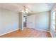 Bedroom with hardwood floors, ceiling fan, and natural light at 1294 Summit Chase Dr, Snellville, GA 30078