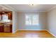 Dining room features hardwood floors and a view to the backyard at 1294 Summit Chase Dr, Snellville, GA 30078