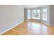 Bright living room featuring hardwood floors and a large bay window at 1294 Summit Chase Dr, Snellville, GA 30078