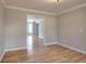 Bright room featuring light hardwood floors, white trim and grey walls at 1294 Summit Chase Dr, Snellville, GA 30078