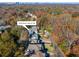 Aerial view of the neighborhood showcasing mature trees and community layout at 3220 Silver Lake Ne Dr, Brookhaven, GA 30319