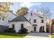 Charming two-story home with a gray roof, white exterior, and a well-manicured front yard at 3220 Silver Lake Ne Dr, Brookhaven, GA 30319