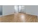 Bedroom with laminate flooring, neutral walls, and natural light from the window at 4555 Cedar Heights Ct, Stone Mountain, GA 30083