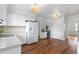 Bright kitchen with sleek appliances, tiled countertops, and ample cabinet space at 4555 Cedar Heights Ct, Stone Mountain, GA 30083